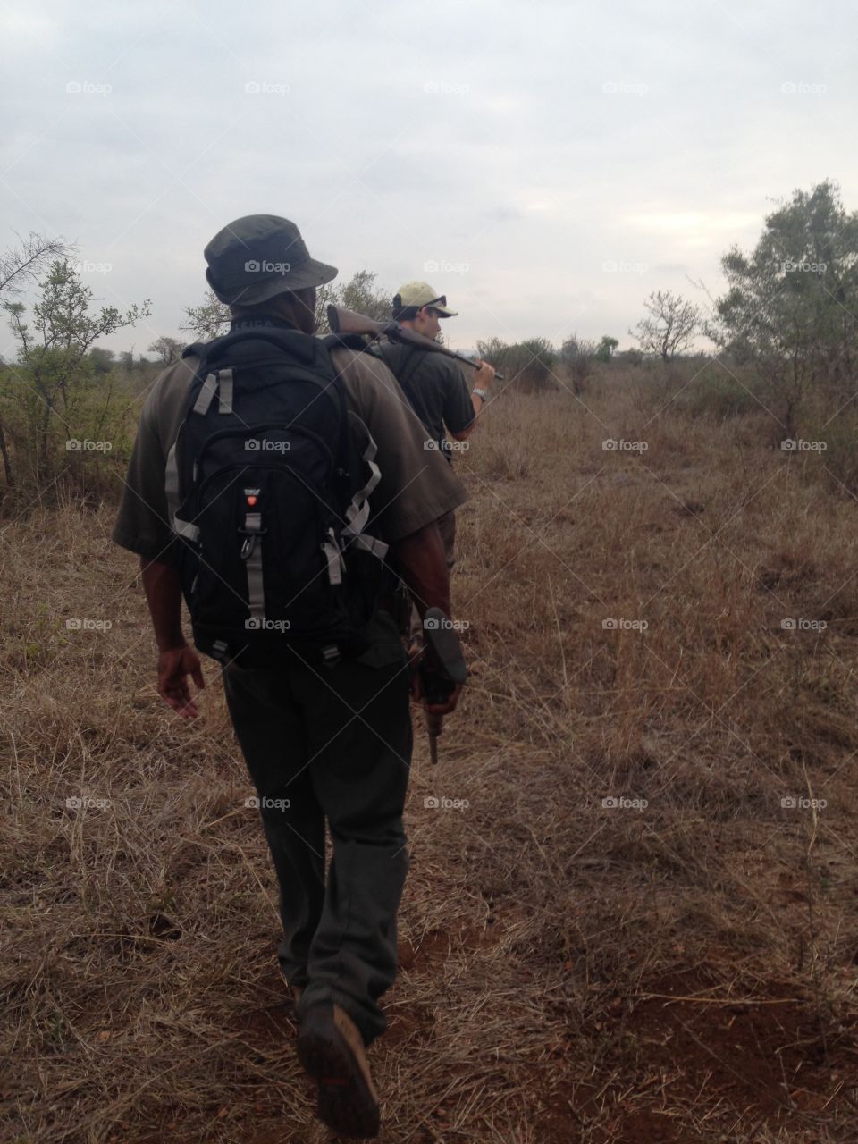 Rangers leading an early morning walking safari in Kruger National Park South Africa