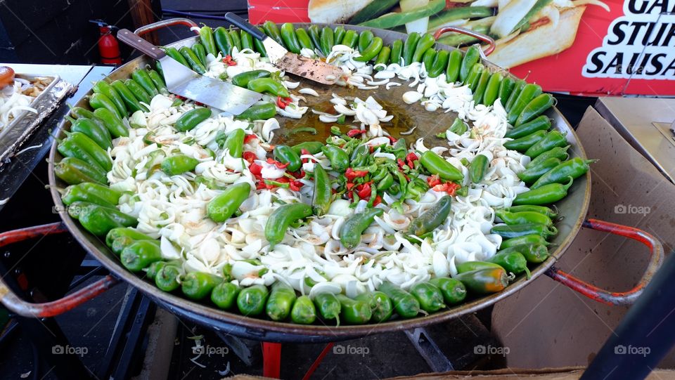 Dare you eat? Chillies being sautéed