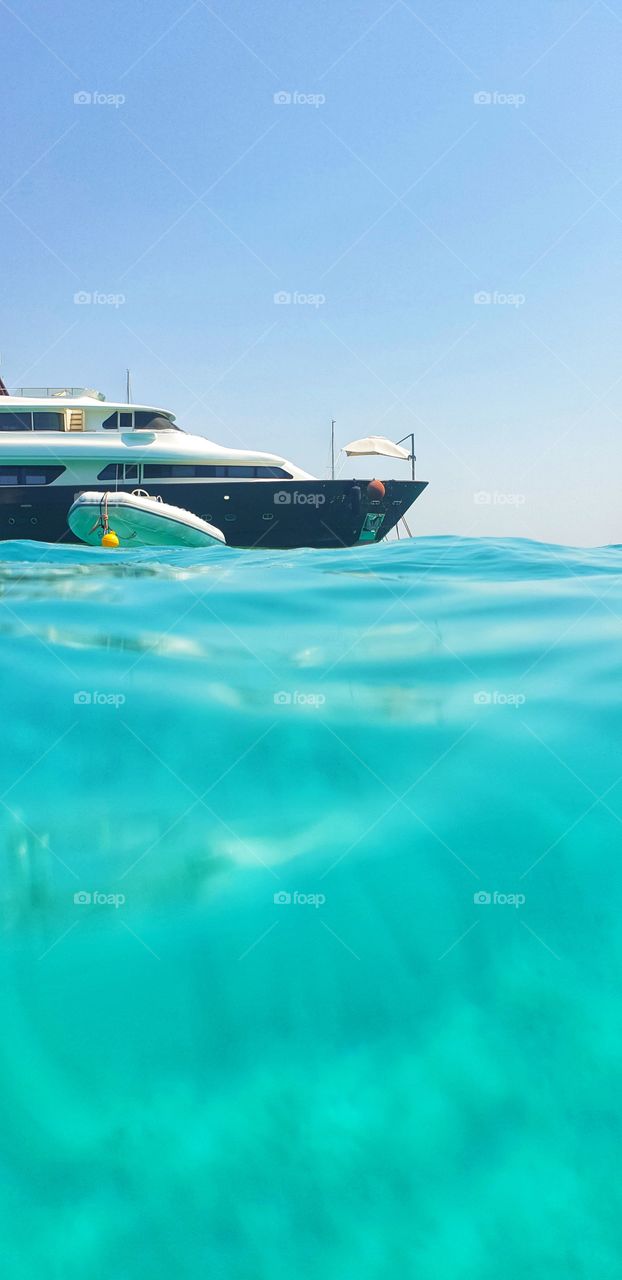 yacht in blue water