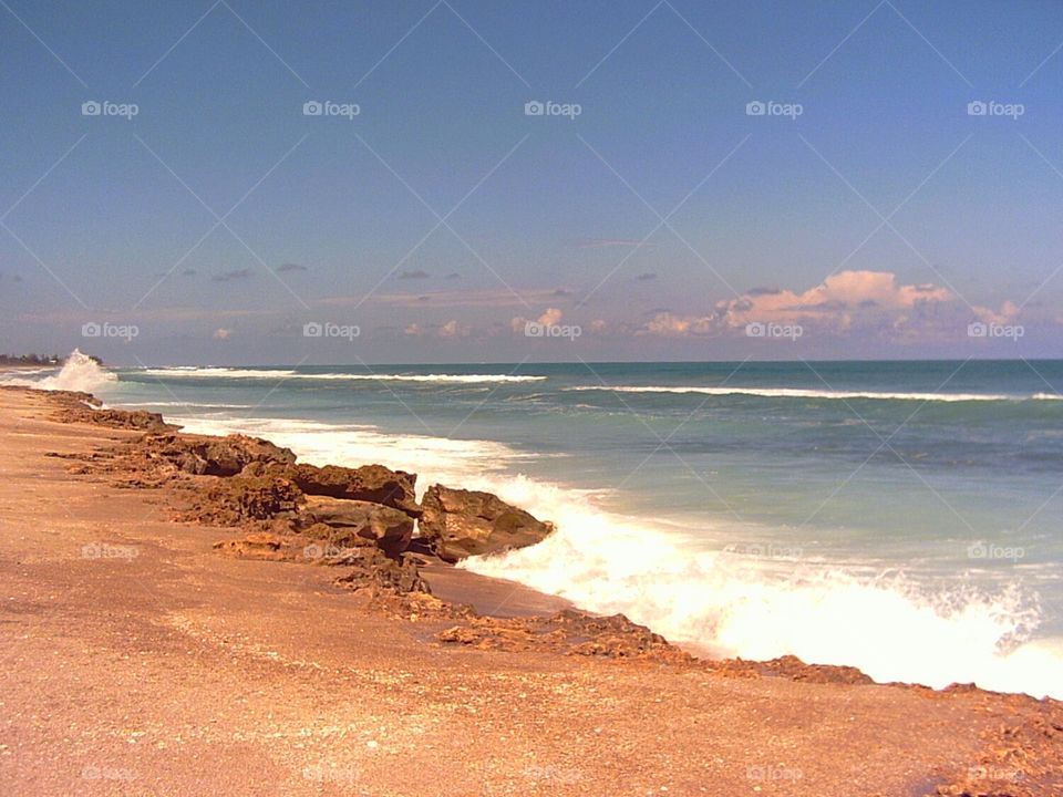 rocky coastline. rocky coastline, surf and horizon; Jupiter's Blowing Rocks Preserve, Florida 