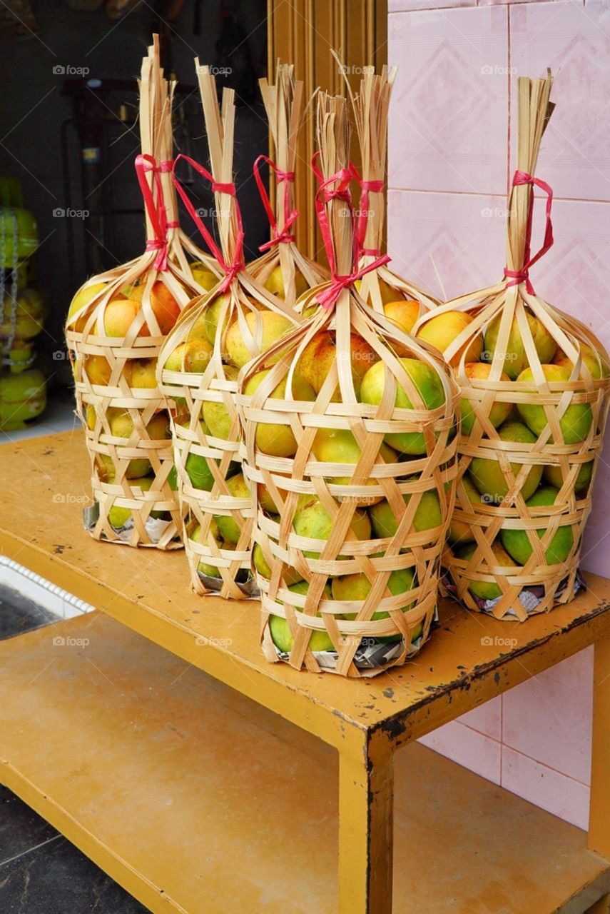 mangoes for sale in baskets