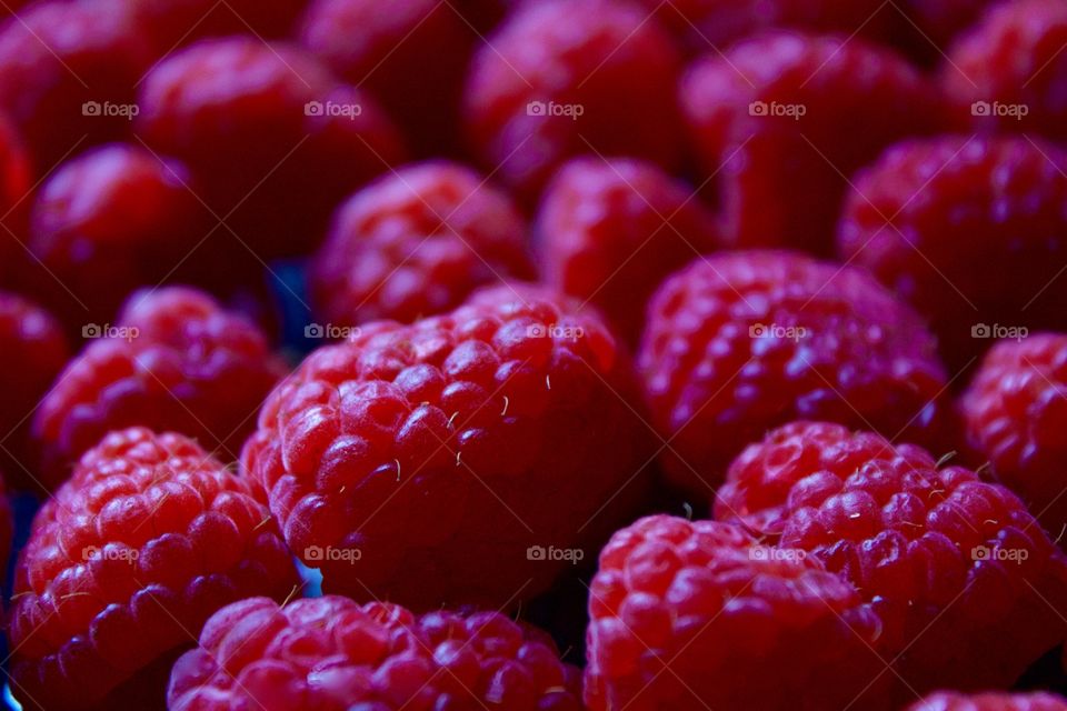Closeup of fresh raspberries in natural light 