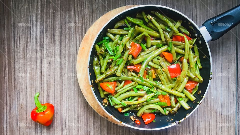 Beans and bell pepper is getting cooked