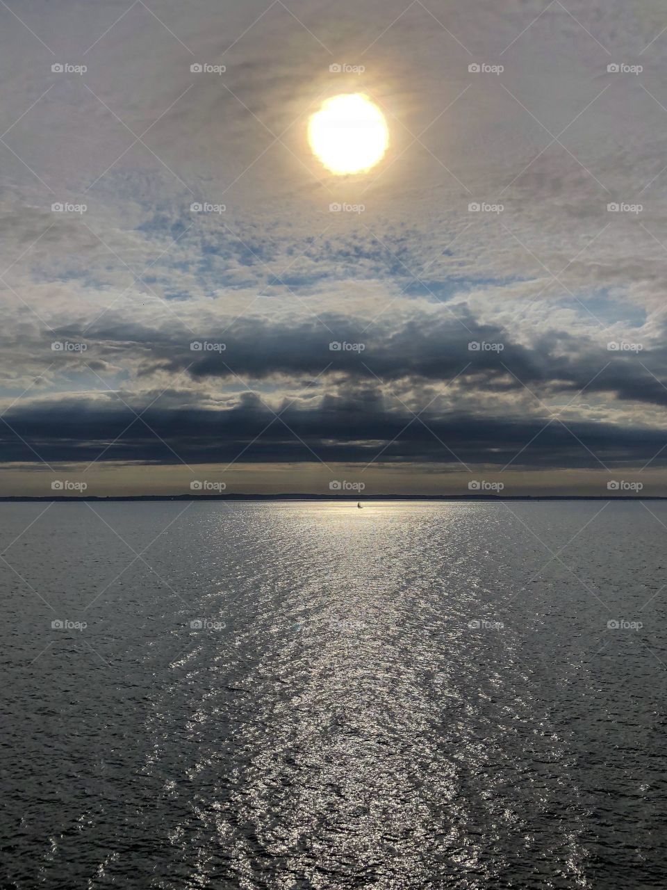 Sun reflecting over Baltic Sea,with some cloud