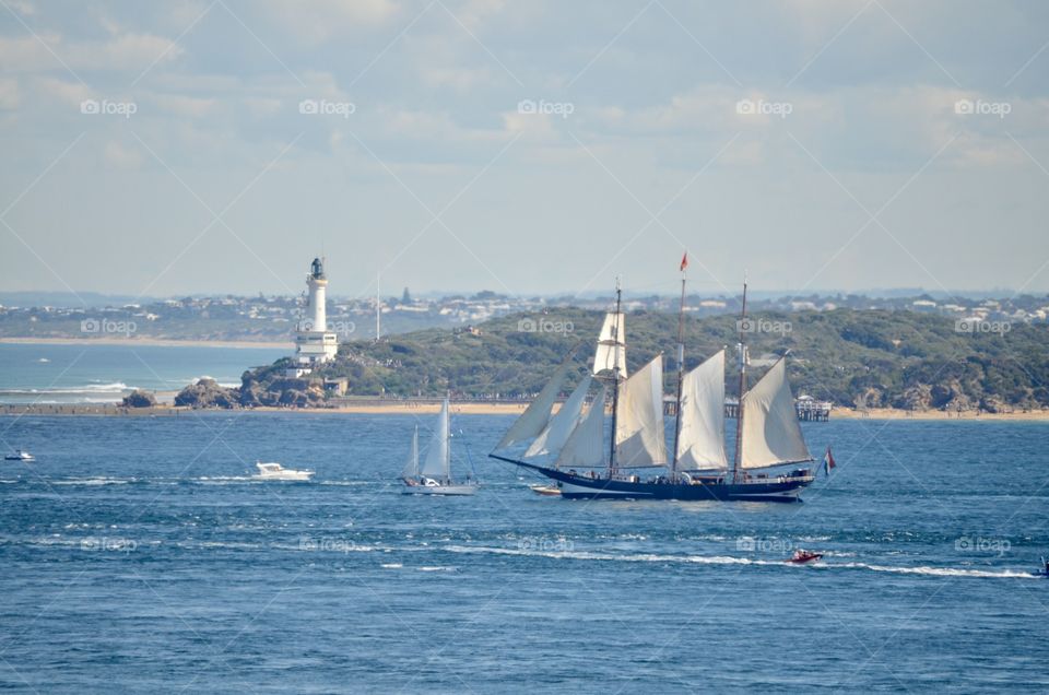 Tall ship sailing through the heads