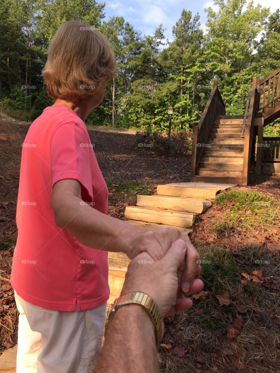 Holding hand up rock steps