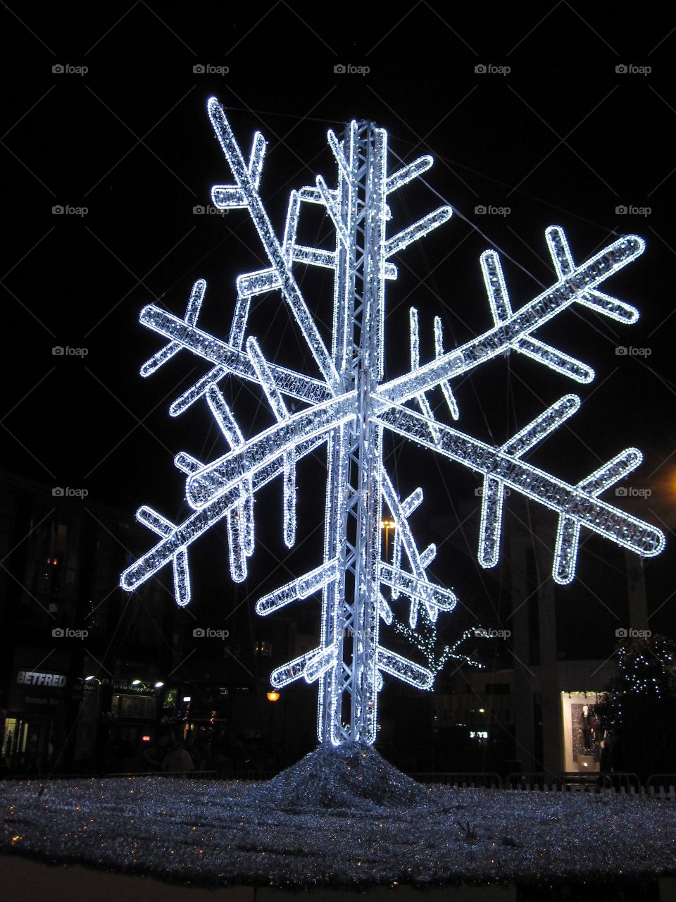 Illuminated snowflake shape during christmas