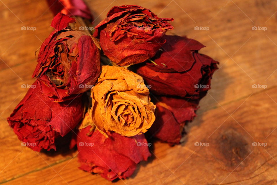 roses on wooden table