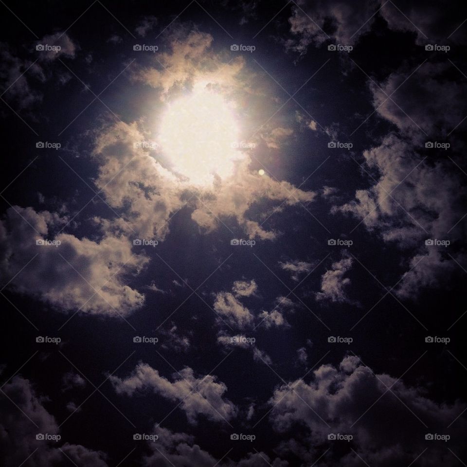 Sun hiding in clouds