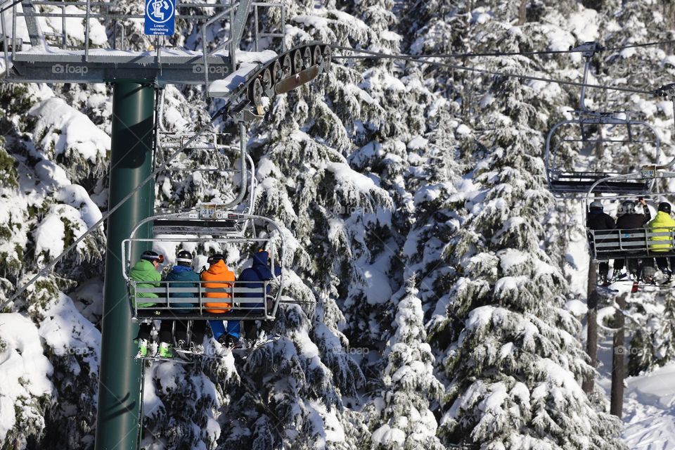 Riding the ski lift
