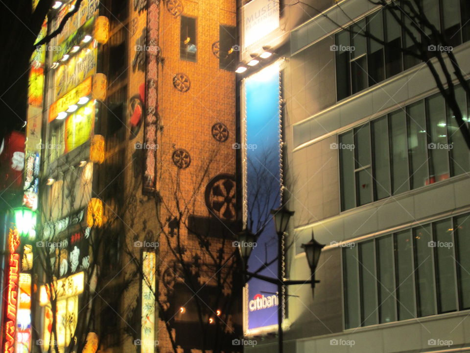 Night View of Buildings on a City Street, Tokyo, Japan.  Architecture and Design