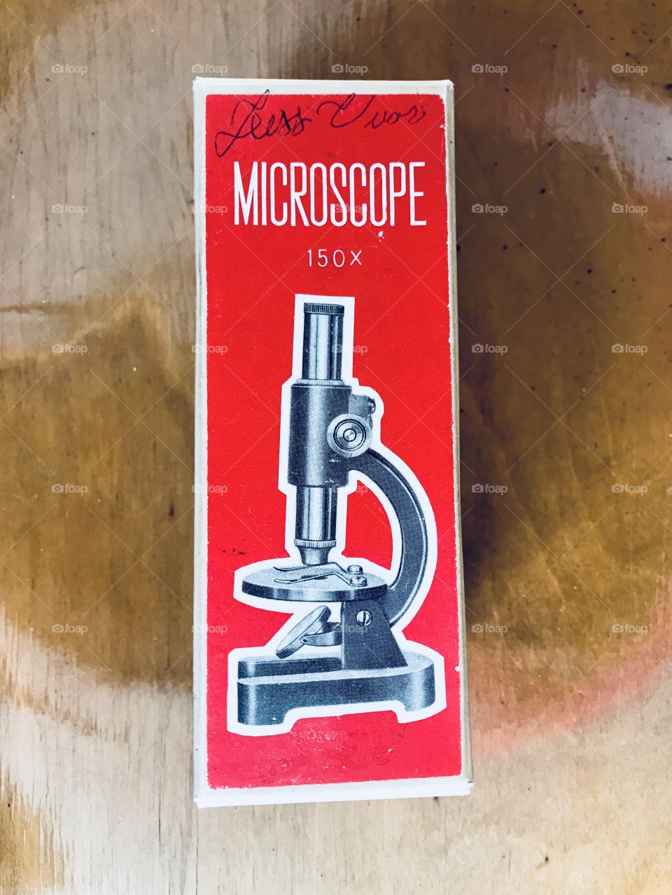 Old Microscope In its container