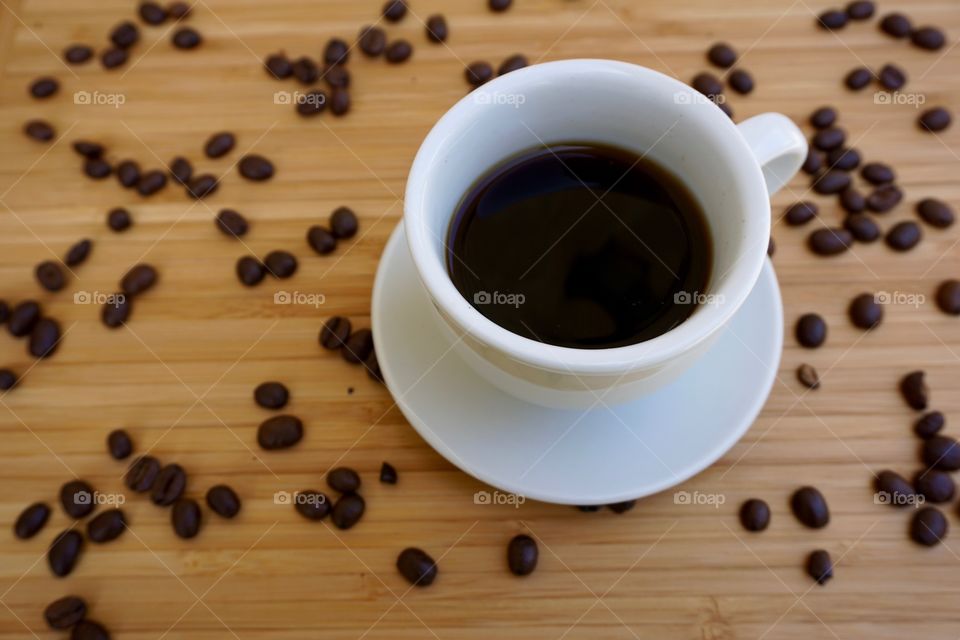 Black coffee with beans