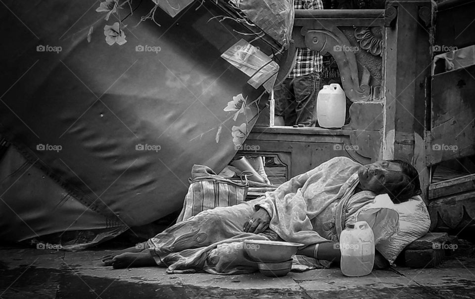 Homeless life on street.  Inside Varanasi I was walking around  I saw a old lady was sleeping on the streets.