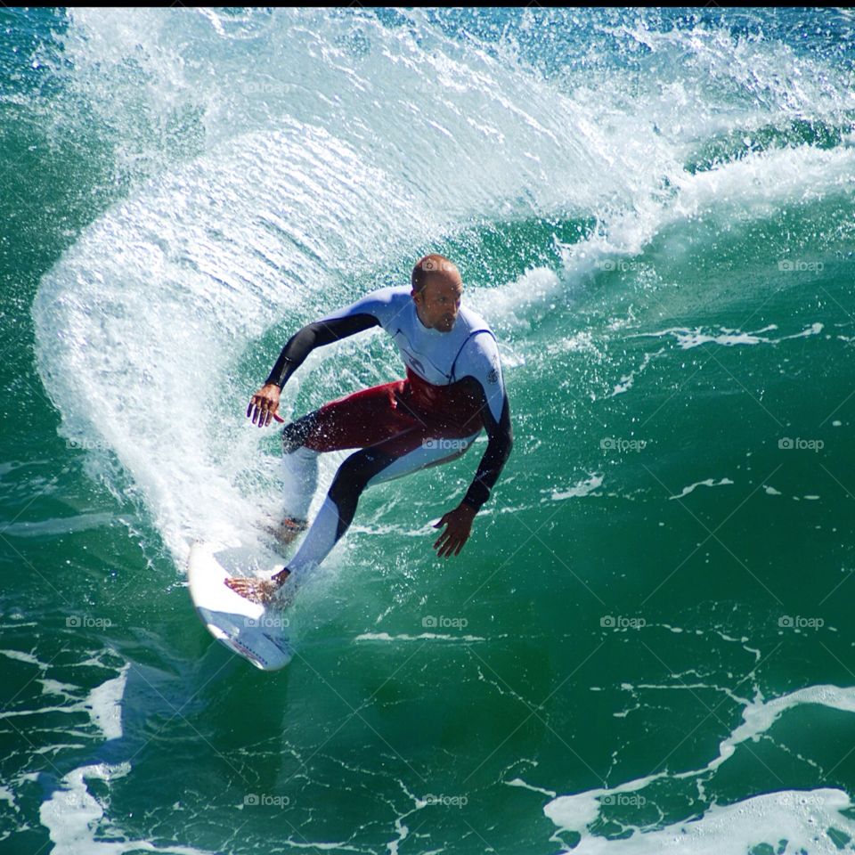 Surfer in Portugal. Jez Browning surfs in Portugal