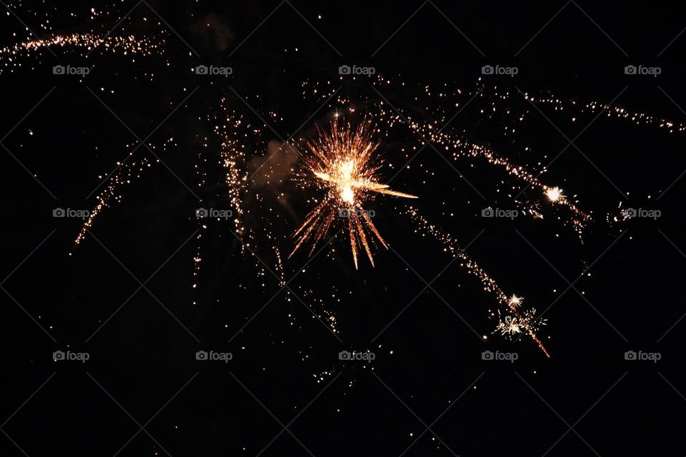 Firework exploding in sky at night