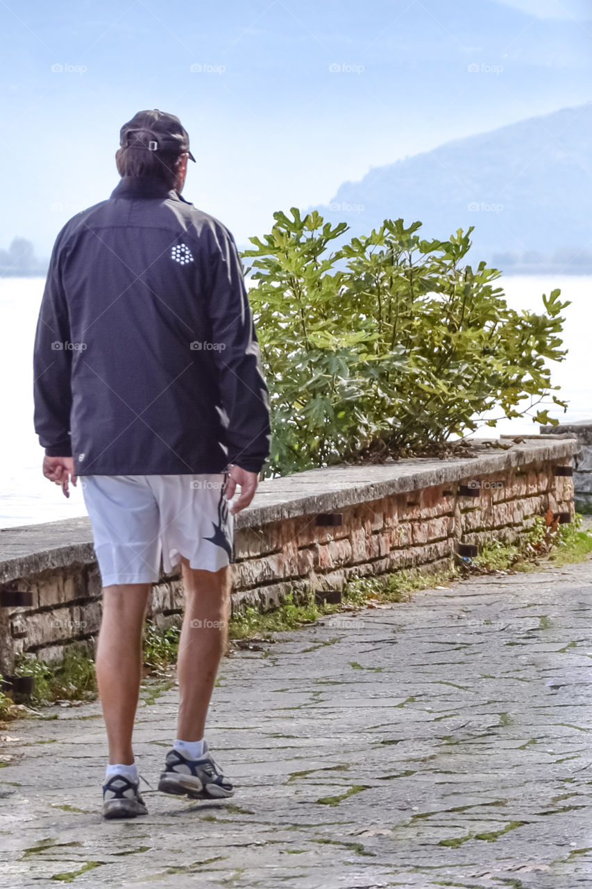 Man Walking In The Street
