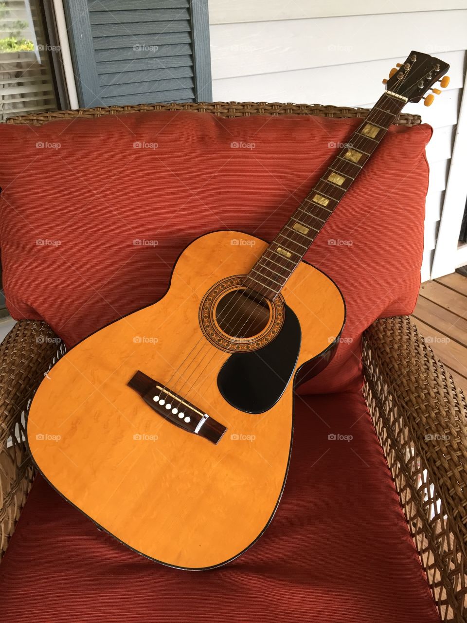 Guitar in a chair. Guitar in a chair