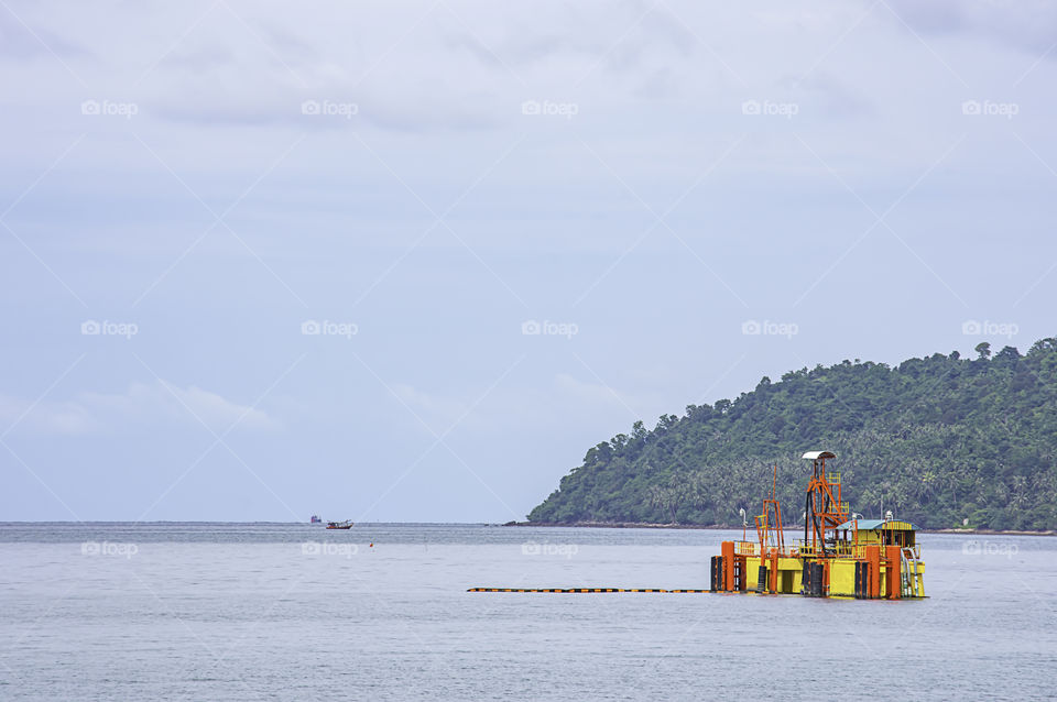 Oil rig and island in the sea coastline at Laem thian beach , Chumphon in Thailand.