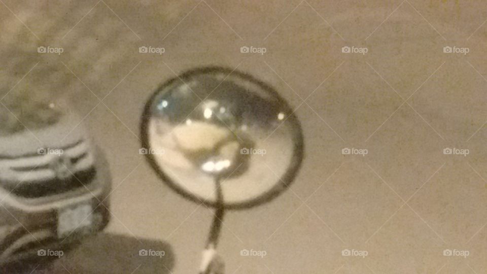 snow in the rearview mirror