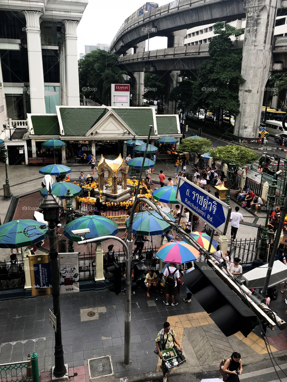 Bangkok, Thailand – July 26, 2018 : A photo of The Erawan Shrine, formally the Thao Maha Phrom Shrine in Ratchadamri road, view from top of the Thai Skytrain (BTS). 