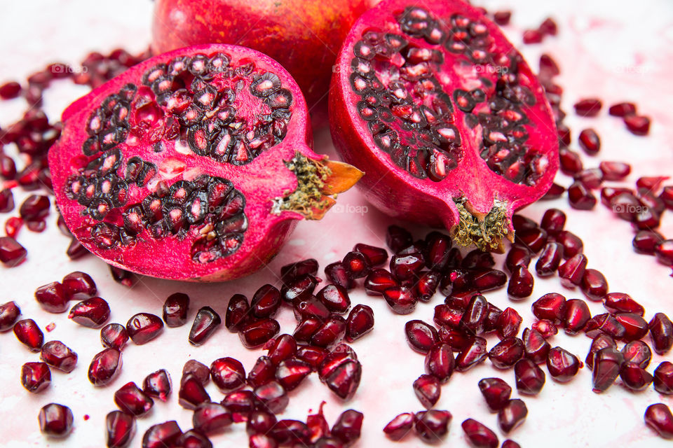 Fresh fruit! Fresh pomegranate and seeds close up