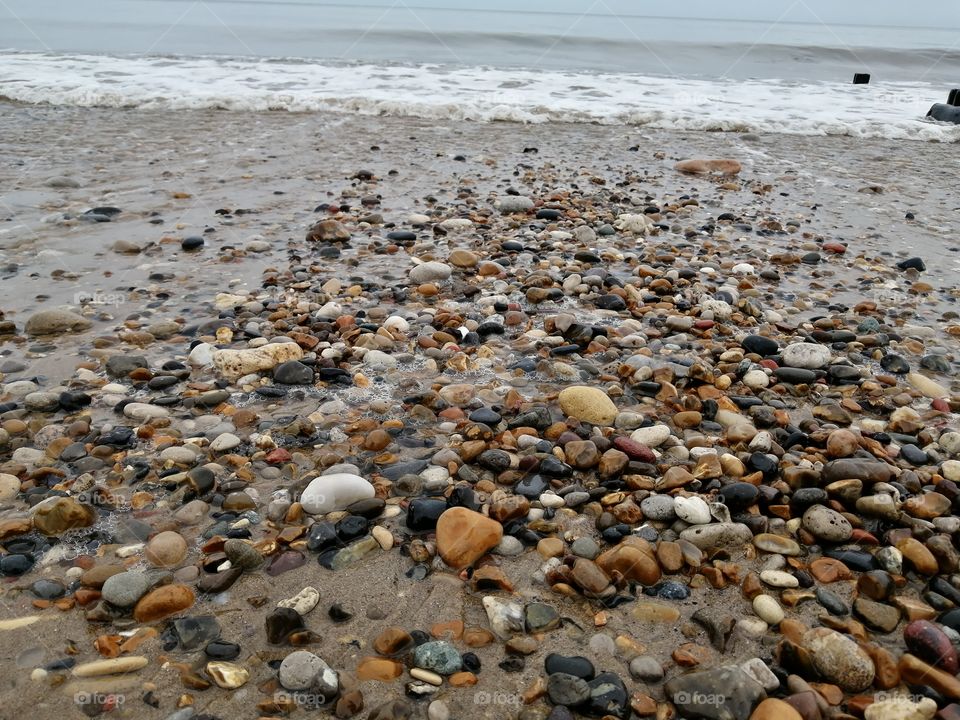 Beach and pebbles.