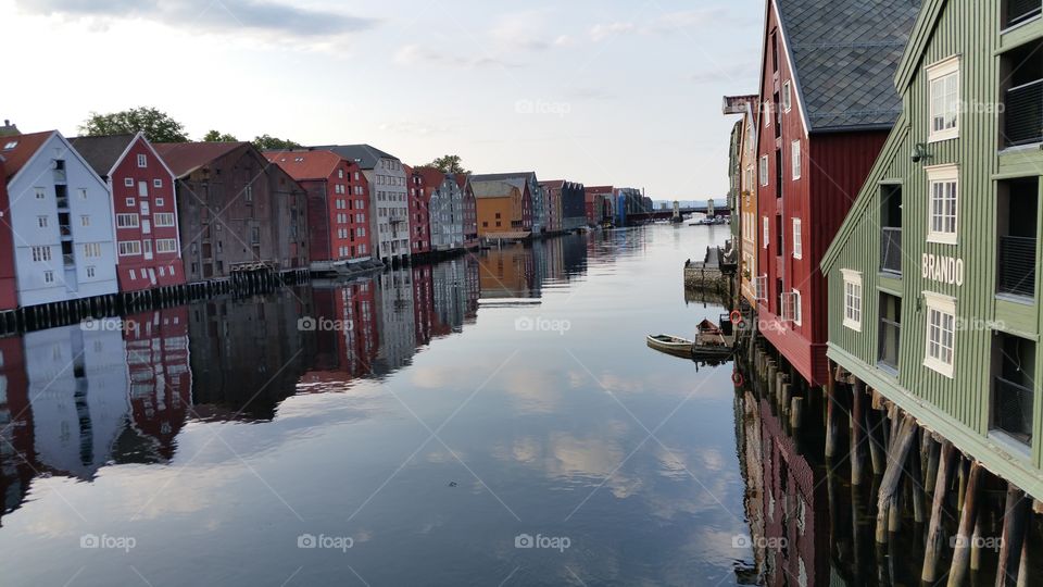 Trondheim. This picture is taken from the old bridge in Trondheim, Norway. We can see "Nidelven" - the river in this beautiful town