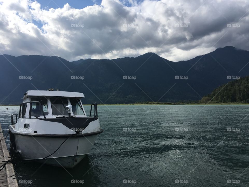 Boat on a fresh glacier water lake in Pitt Meadows British Columbia Canada 