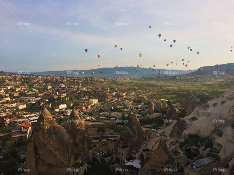 Cappadocia Rise. Hot air balloons rise with the sun in Turkey