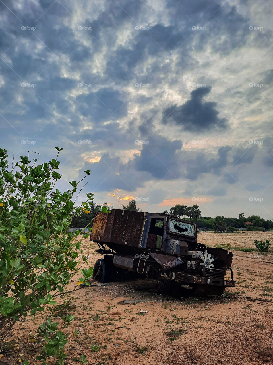 Horrific remainings of the 30 year civil war of Sri Lanka. Military vehicle with shattered glasses and destroyed in the war. May there be peace until the end. No more war. No more fighting.