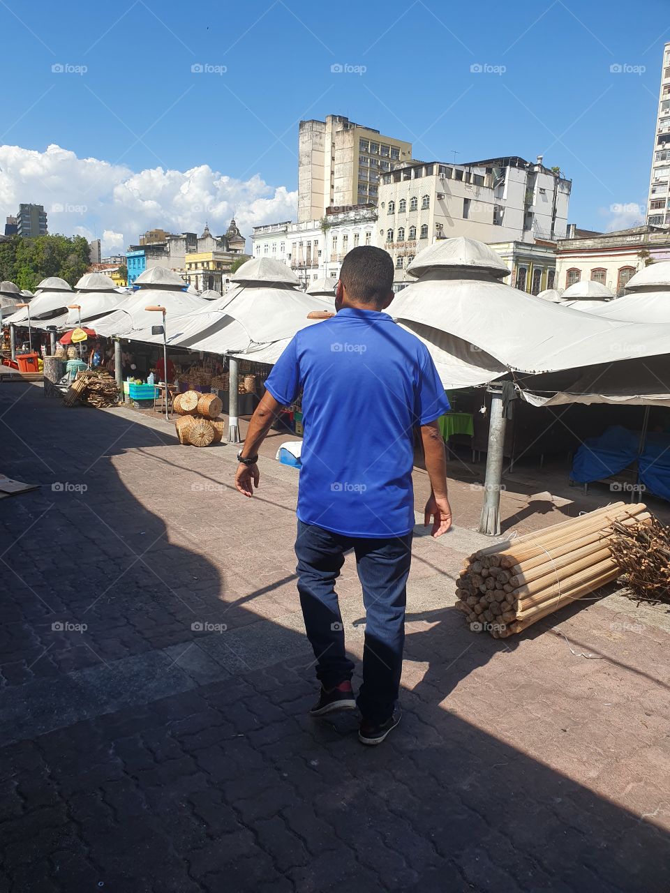 A men walking on "Ver-o-Peso" market in Belém, Pará, Brazil.