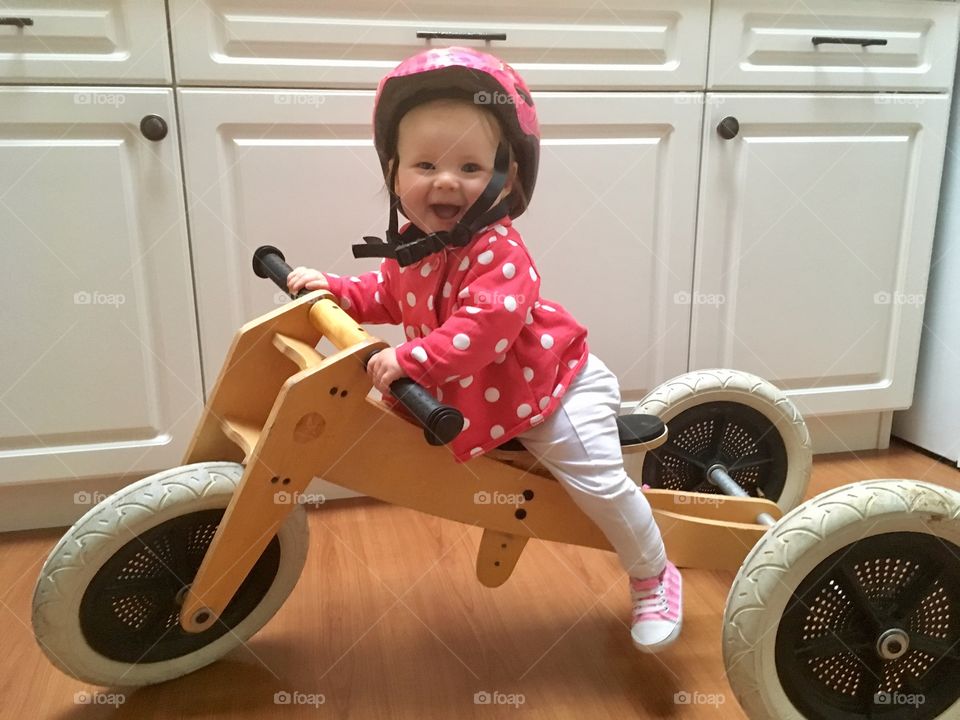 Baby riding a bike for the first time