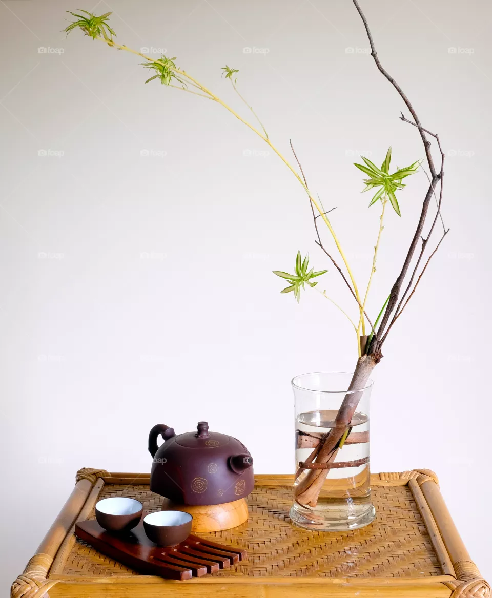 Still life with tea and flowers
