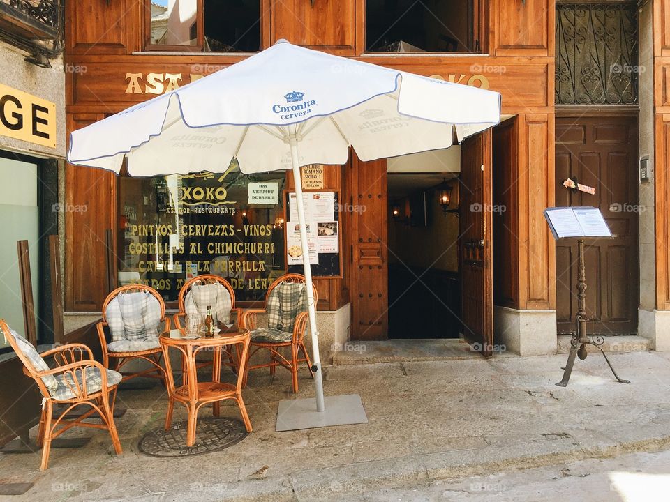 Outdoors restaurant with parasol