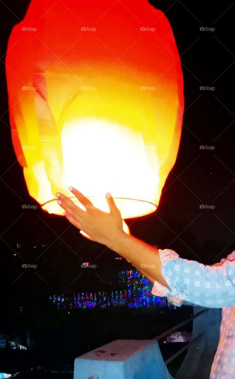 Paper sky lantern ready for the take off.