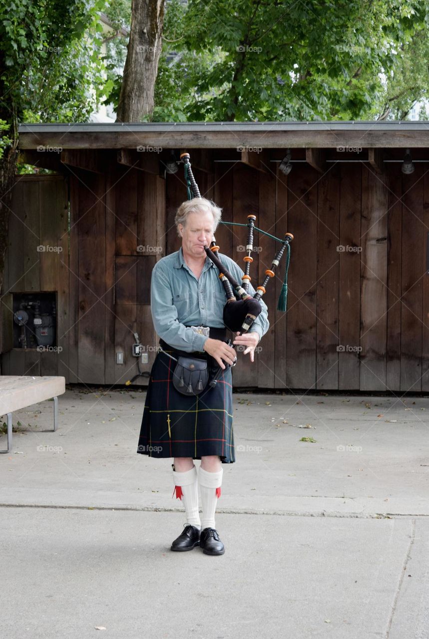 Playing bagpipes 