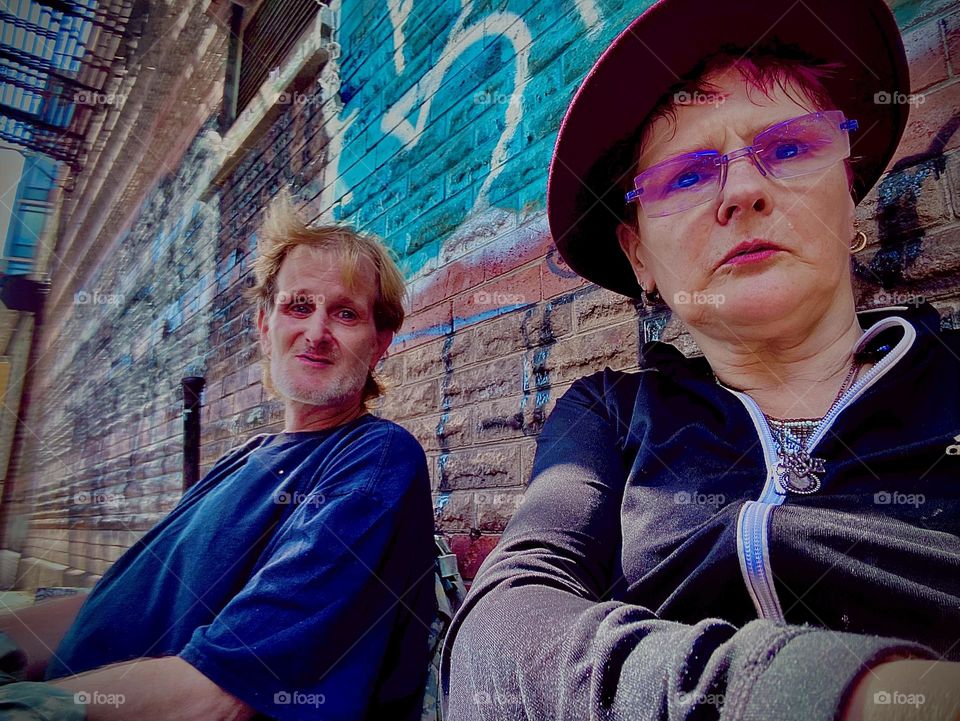 “Timothy Trespas”, my sweetheart and I, “Petra Schiller” are sitting on the sidewalk on “Waverly St” in “Clinton Hill”, Brooklyn on an early summertime afternoon in 2021. Hypnotic Productions