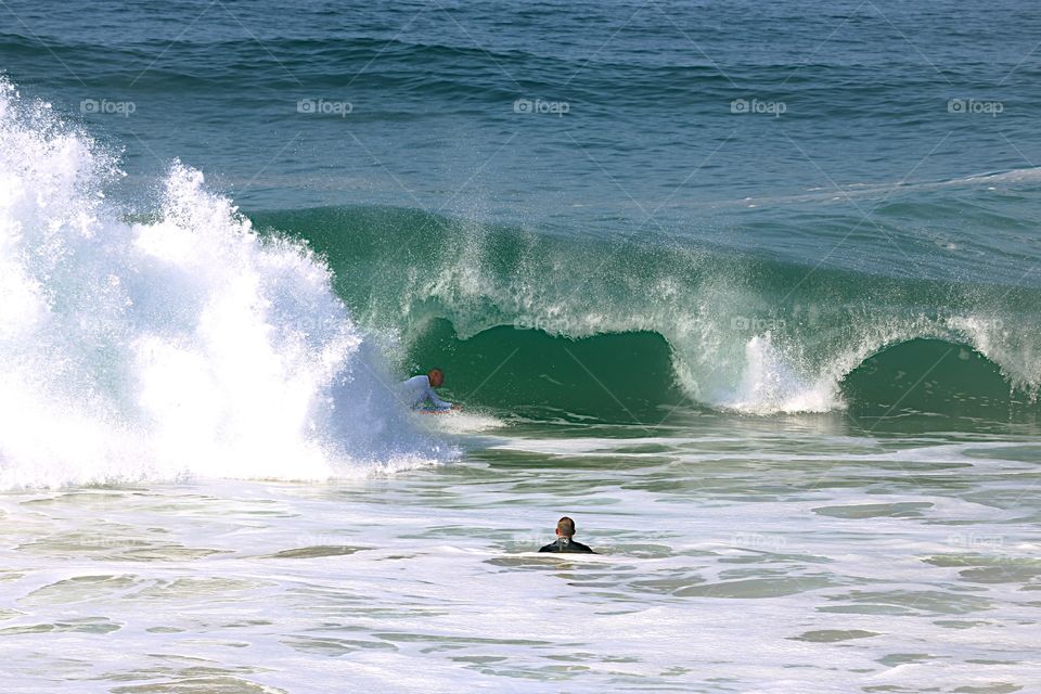 Surfer in the tube at The Wedge, Newport Beach, CA