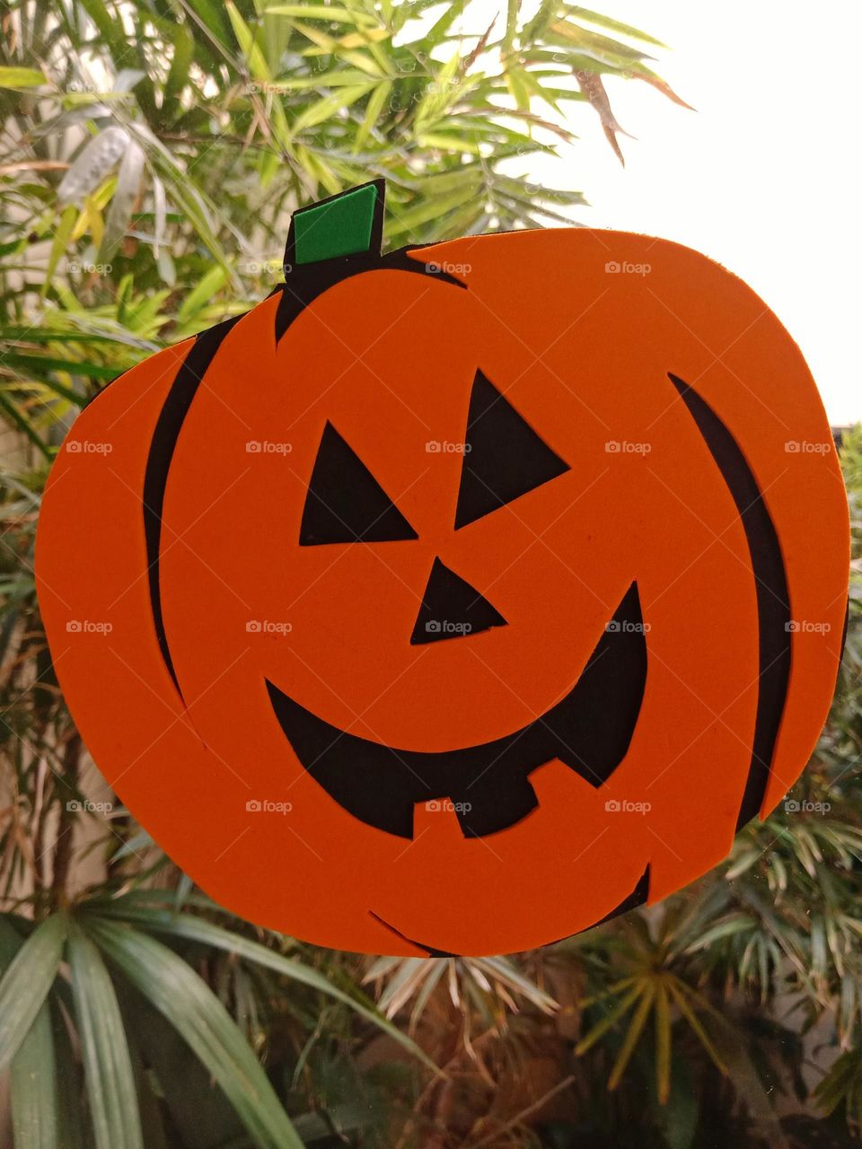 Halloween pumpkin decoration on a window
