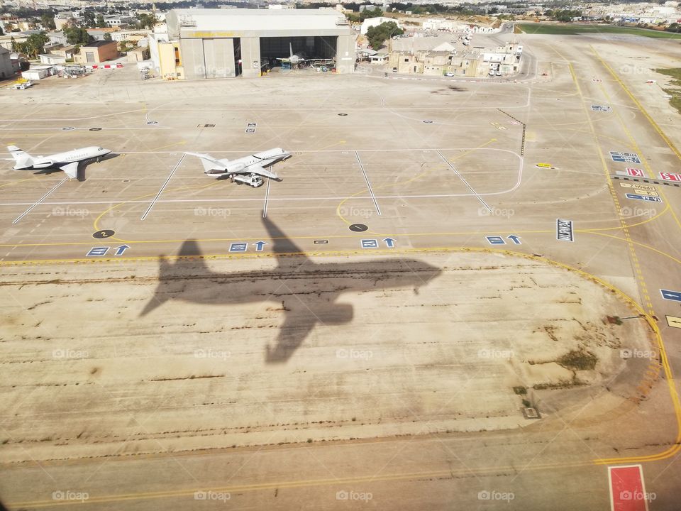 Airplane shadow in flight