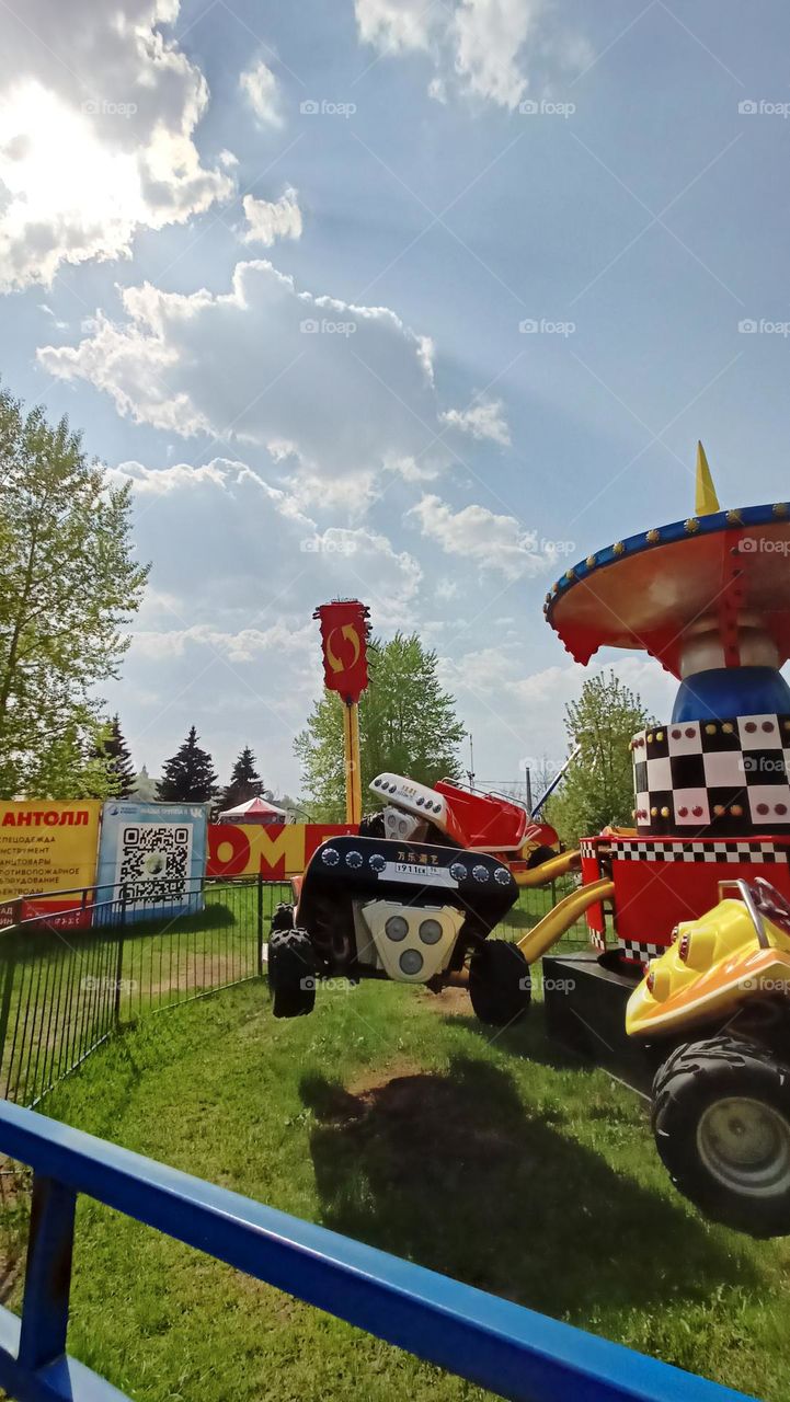 amusement park, attraction, cars, for children, may, spring, clear day, red, sky, clouds, sun, yellow