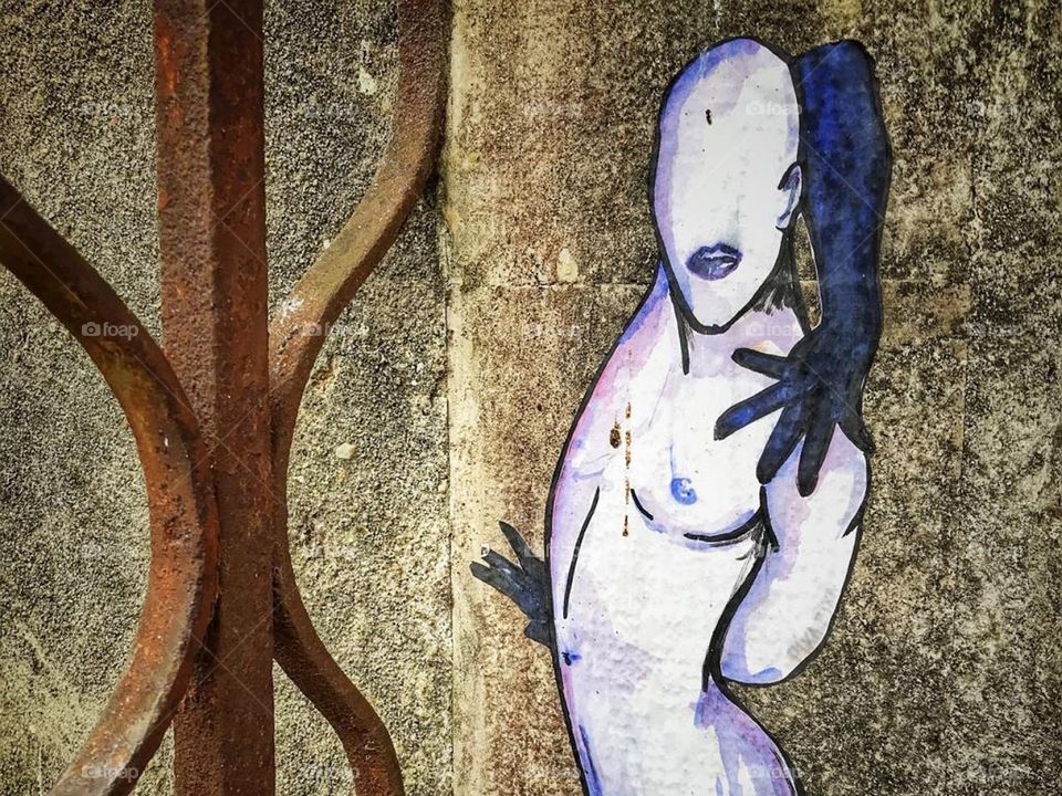 Painting in a wall, Lisbon, Portugal.