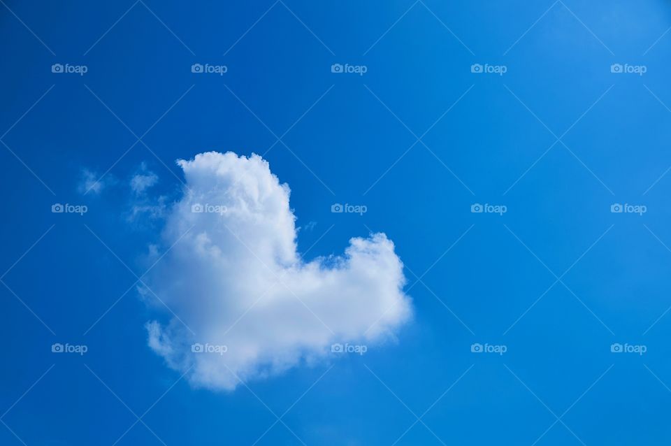 Clouds and blue sky background with copy space 