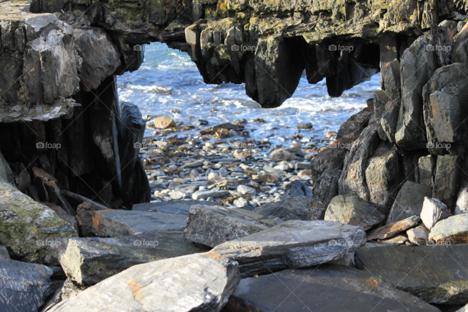 rocks seaside blue scotland by hollums