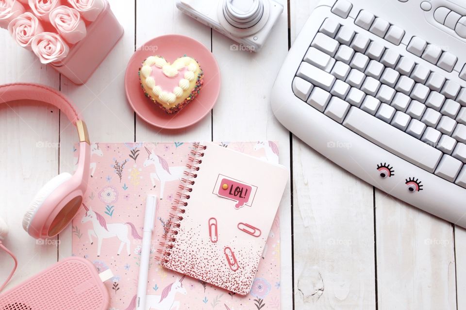 White desk with pink accessories and unicorns 🦄