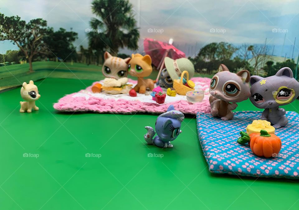 Characters LPS Toys For Kids Having A Picnic Scene With Our Exclusive Personal Photo Background From The Park In A Tropical Environment Looking At An Actual Real Mini Sandwich.