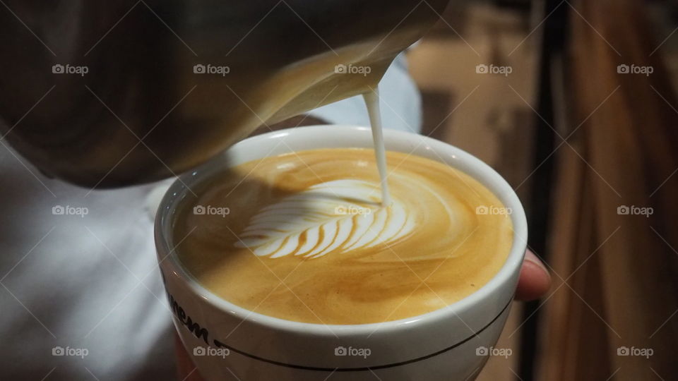 Cappuccino coffee latte art making