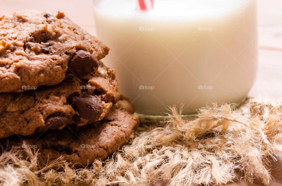Close-up of cookies with milk