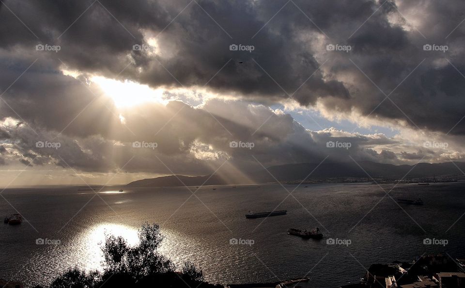 Amazing Light clouds sun and sea
